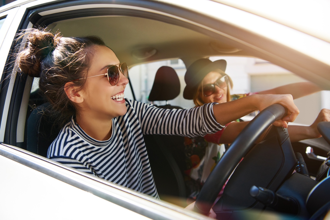 Two women driving in their car