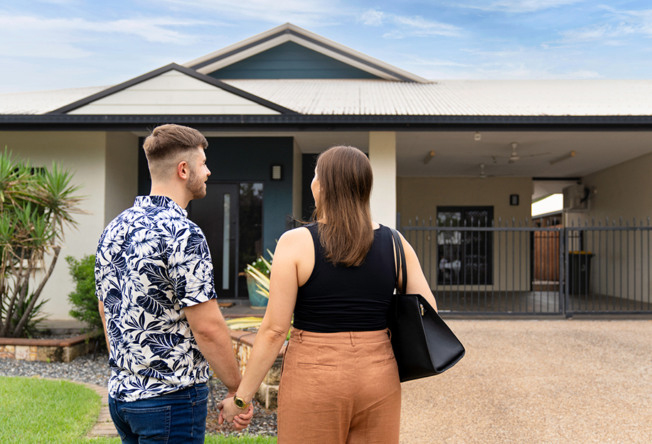 Couple looking a their new house