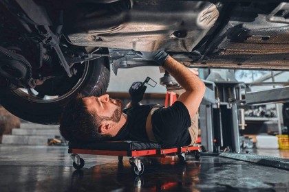 Man servicing a car