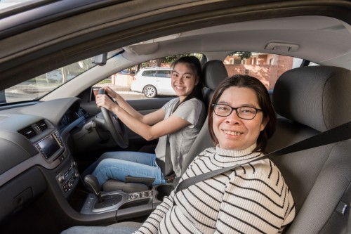 Mum teaching daughter to drive