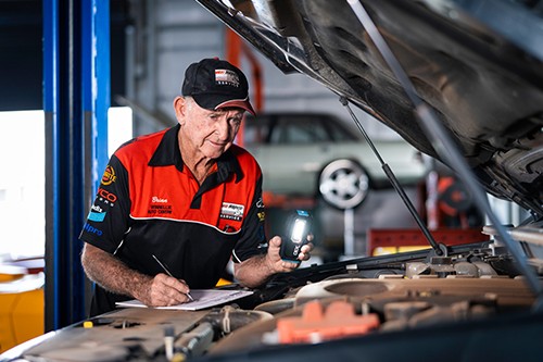 Mechanic checking a car