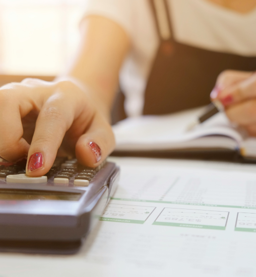 Person doing calculations on a calculator